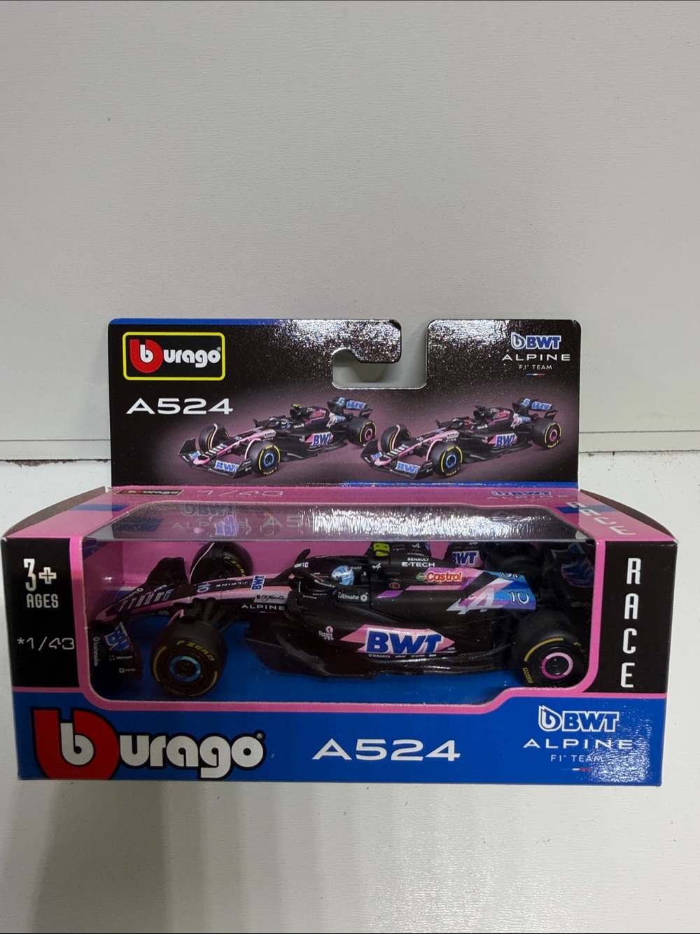 Bburago A524 BWT Alpine F1 Team Diecast Car - Pink & Blue with driver